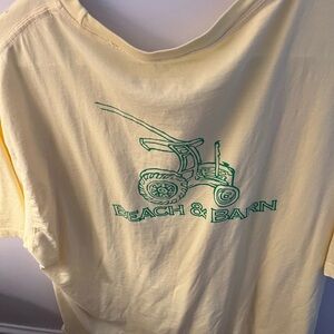 Beach & Barn Yellow T-Shirt with Green Tractor Logo with chicken in seat on back